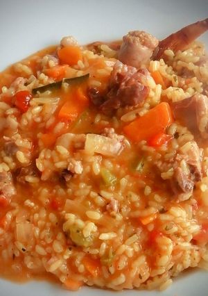 Una foto de El ArrozCaldoso con picada de almendras y "alGusto" de Can Llums