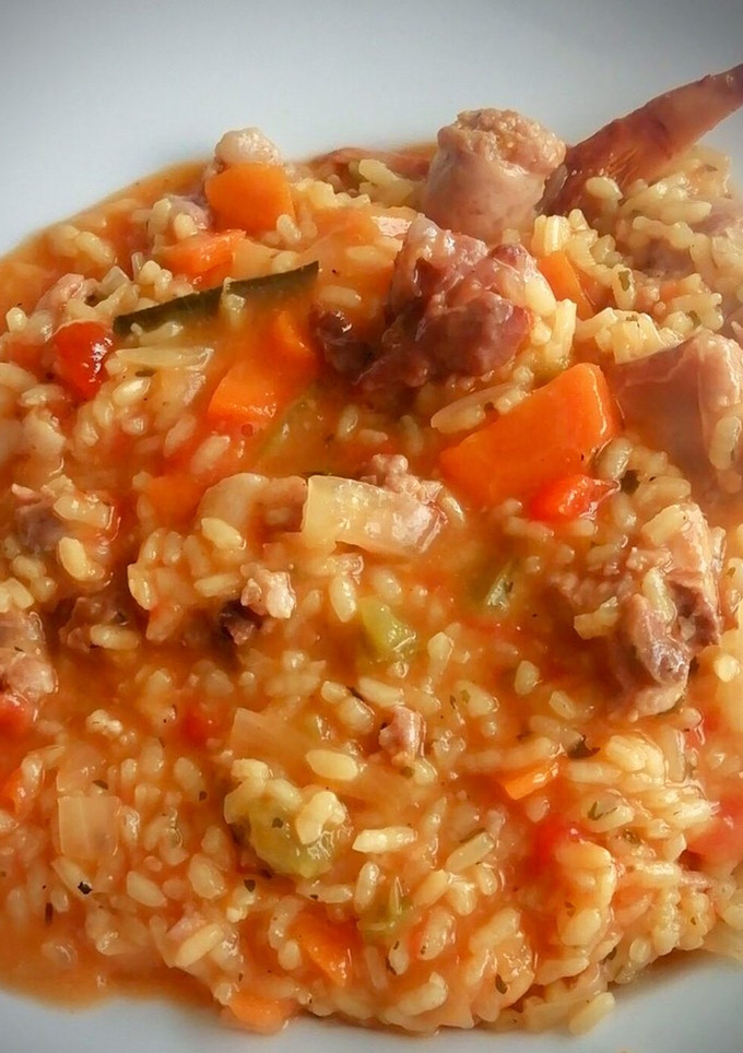 Una foto de El ArrozCaldoso con picada de almendras y "alGusto" de Can Llums