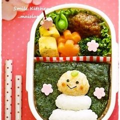 A picture of New Year's Charaben Mr. Kagami-mochi Mikan.