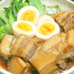 A picture of Meltingly Tender Simmered Pork Belly Cubes in a Rice Cooker.