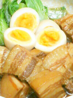 A picture of Meltingly Tender Simmered Pork Belly Cubes in a Rice Cooker.