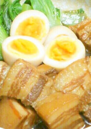 A picture of Meltingly Tender Simmered Pork Belly Cubes in a Rice Cooker.