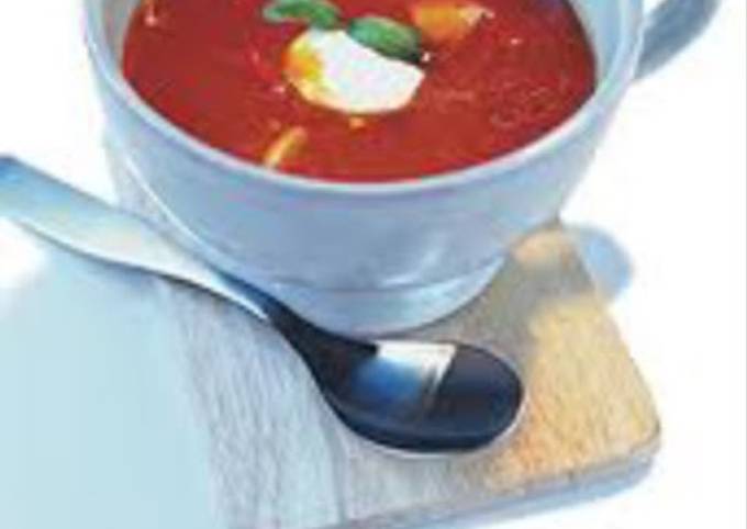 Tomato soup with feta cheese topping