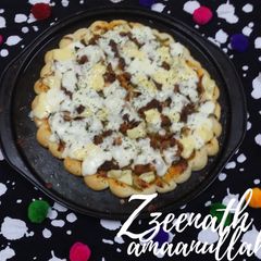 A picture of Mini Bites Chicken Pizza.
