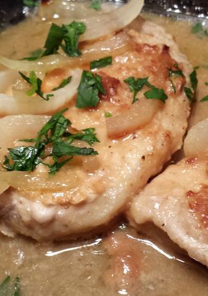 A picture of Pork Chops w/ Buttermilk Gravy.