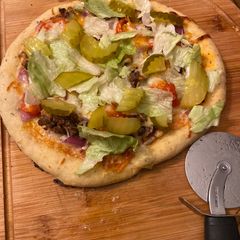 A picture of Deluxe hamburger pizza.
