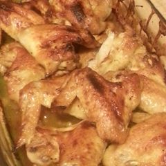 A picture of Baked chicken with apricot jam, sage, and lemon zest.