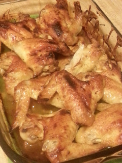 A picture of Baked chicken with apricot jam, sage, and lemon zest.