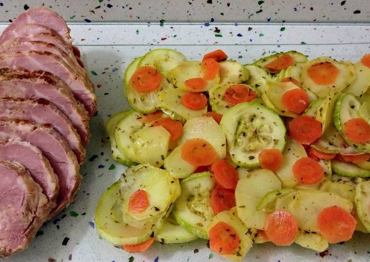 Solomillo relleno de pistachos, foie y pasas con verduras al vapor