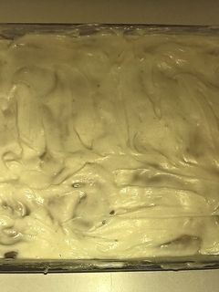 A picture of Homemade cinnamon rolls w/ cream cheese frosting.