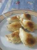Empanadas de carne de cerdo, repollo y zanahoria