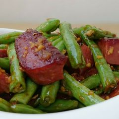 A picture of Green Bean And Spam With Orange Ginger Sauce.