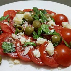 A picture of Simplest tomato salad in the world.
