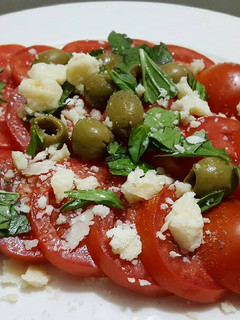A picture of Simplest tomato salad in the world.
