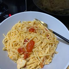 A picture of Pasta with Cherry Tomatoes and Chicken.