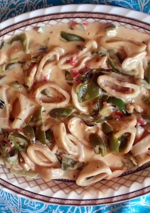 A picture of sizzling squid Alfredo.