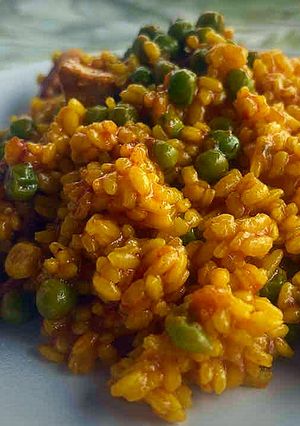Una foto de Arroz con carne en adobo