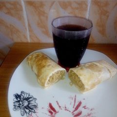 A picture of Noodles wrapped in fried Eggs.