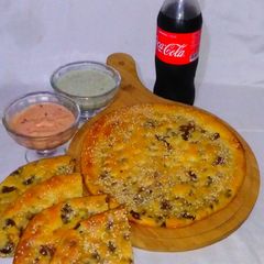 Creamy mince Naan with mayo chilli garlic dip A picture of Creamy mince Naan with mayo chilli garlic dip.
