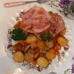 A picture of Gammon joint glazed with honey and mustard.