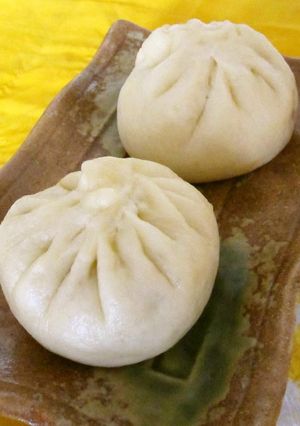 A picture of Carrot Filled Steamed Buns - A Dim Sum Item.