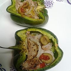 A picture of Tuna steak stuffed peppers.