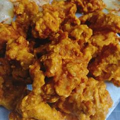 A picture of Fish pakoras with grilled potatoes.