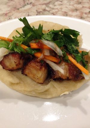 A picture of Siu Yuk Bao (Roasted pork belly sandwich).