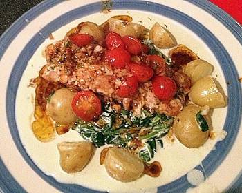 How To Serving Recipe Salmon with cherry tomatoes creamed spinach and new potatoes Delicious and Healthy