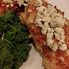 A picture of Chicken Cutlets Topped With Blue Cheese.