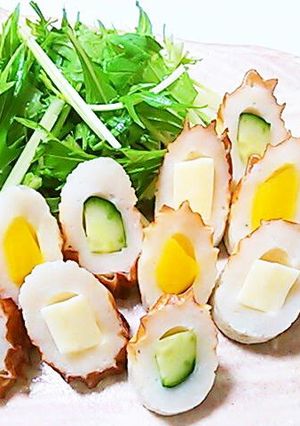 A picture of Chikuwa Stuffed with Cheese, Cucumbers, and Takuan.