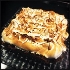 A picture of S'mores Bars with Belgian Chocolate Brownie and Marshmallow Meringue.