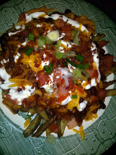 A picture of Chili cheese fries.