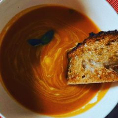A picture of Roast Butternut Squash & Tomato soup with Greek Yogurt.
