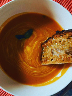 A picture of Roast Butternut Squash & Tomato soup with Greek Yogurt.