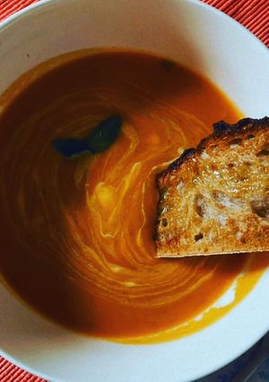 A picture of Roast Butternut Squash & Tomato soup with Greek Yogurt.