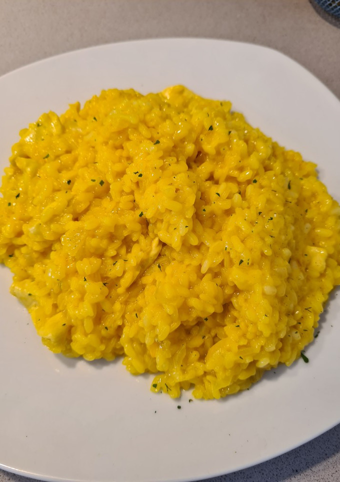 Una foto de Risotto a la milanesa con pollo