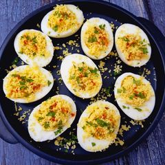 A picture of Oeufs Mimosa (French-Style Devilled Eggs).