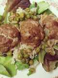 Turkey Meatballs w/ brown rice & peas over a bed of mixed greens