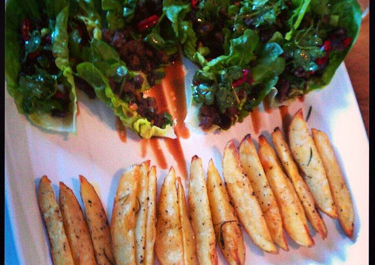 Chilli beef in lettuce cups with roast potato wedges