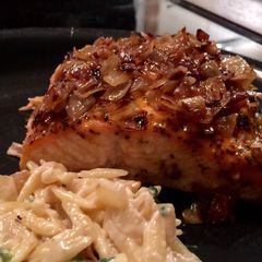 A picture of Baked Salmon with Caramelized Onions.