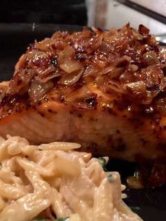 A picture of Baked Salmon with Caramelized Onions.