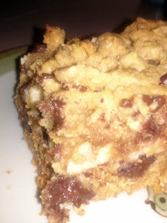A picture of Peanut butter Chocolate chip cheesecake Bars.