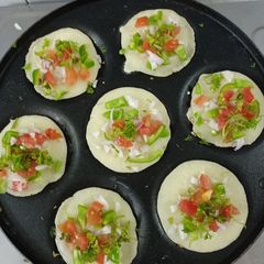 Mini uttapam A picture of Mini uttapam.