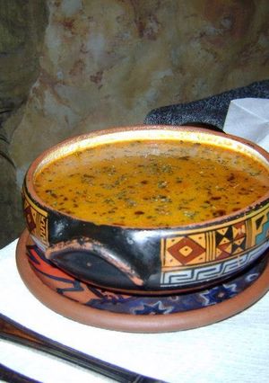A picture of aguadito de pollo. (Peruvian chicken soup).