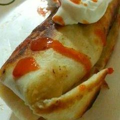 A picture of Cheddar Wurst Egg Burrito Delight.