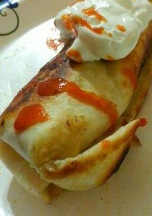 A picture of Cheddar Wurst Egg Burrito Delight.