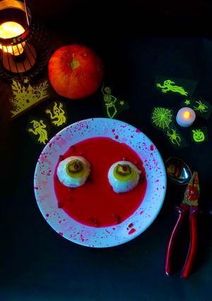A picture of Coconut milk pudding with pomegranate juice.