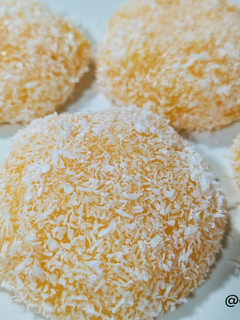Una foto de Pastelitos de mandarina con coco