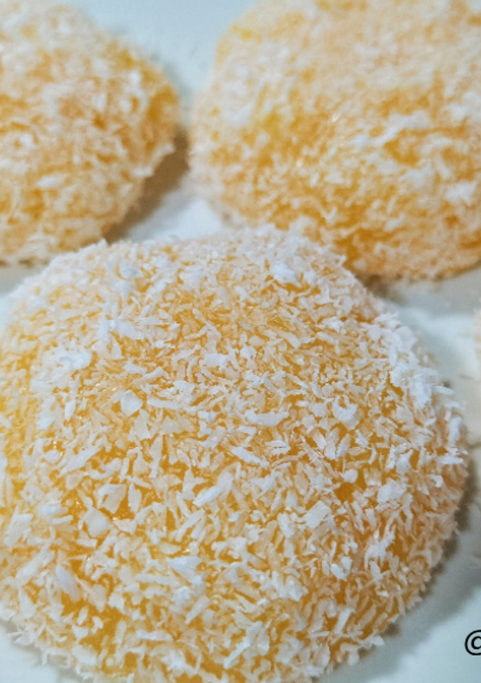 Una foto de Pastelitos de mandarina con coco
